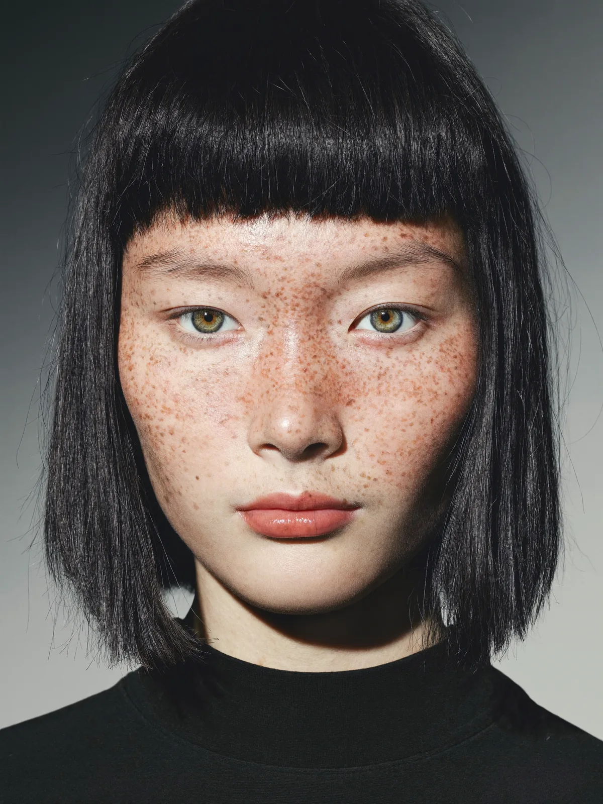 Aylin, AI-generated model for the editorial: black bob, freckles